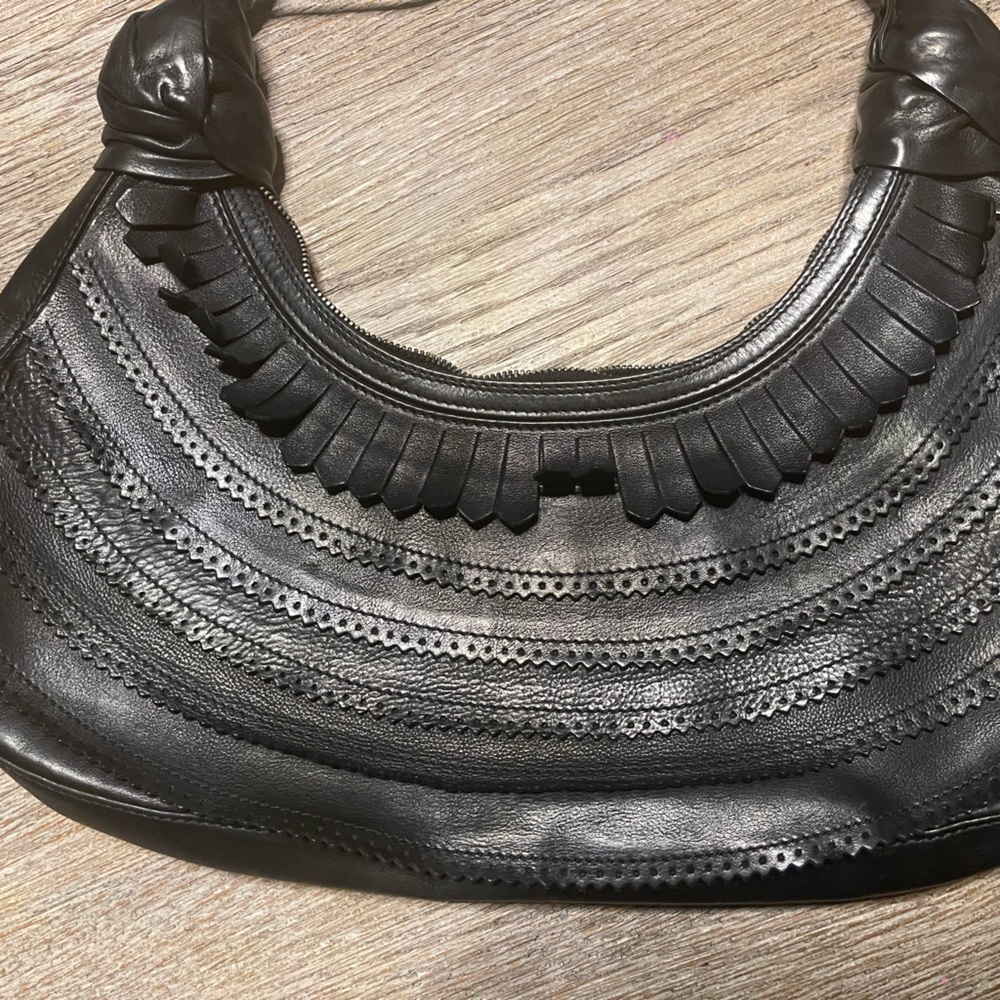 Christian Louboutin black leather purse.